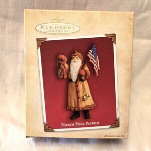 NORTH POLE PATRIOT- Santa w/American Flag. Hallmark Keepsake Christmas Ornament.